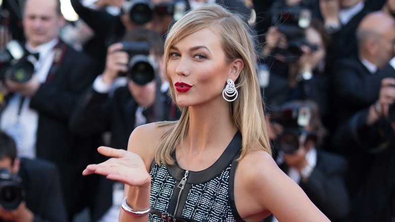 Karlie Kloss blowing a kiss