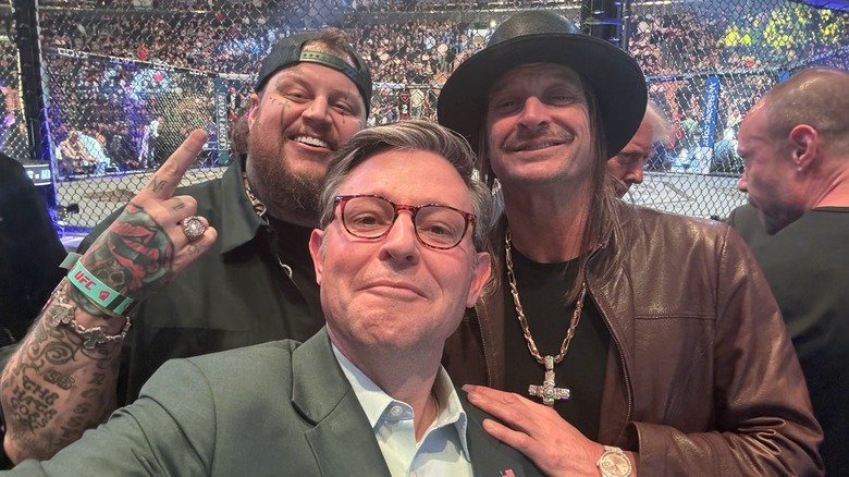 Jelly Roll, Mike Johnson, and Kid Rock at a UFC event.