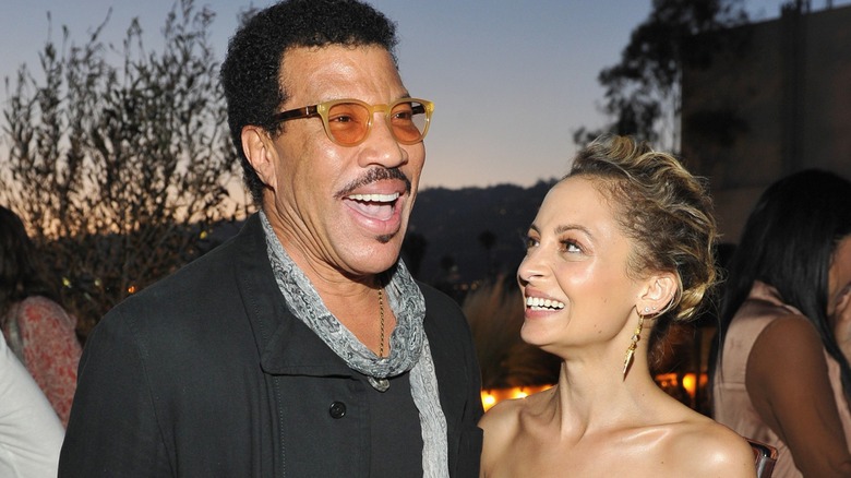 Nicole and Lionel Richie smiling