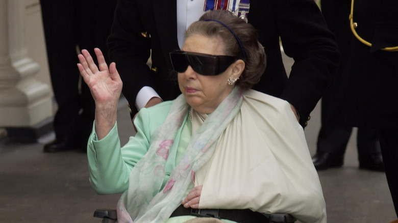 Princess Margaret in a wheelchair waving