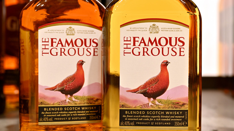 Tow bottles of The Famous Grouse whisky