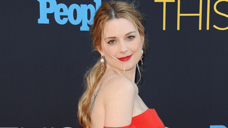 Alexandra Breckenridge smiling at an event