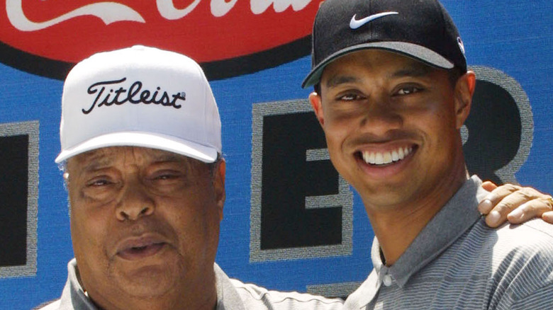 Earl and Tiger Woods smiling