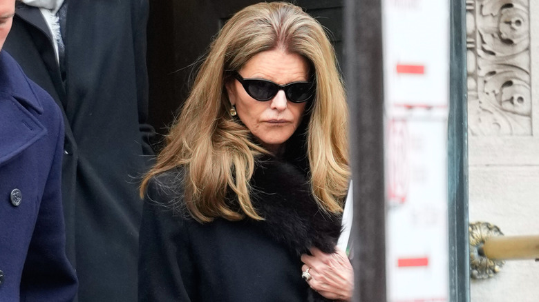 Maria Shriver looking down