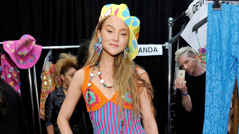 Devon Aoki at fashion show 