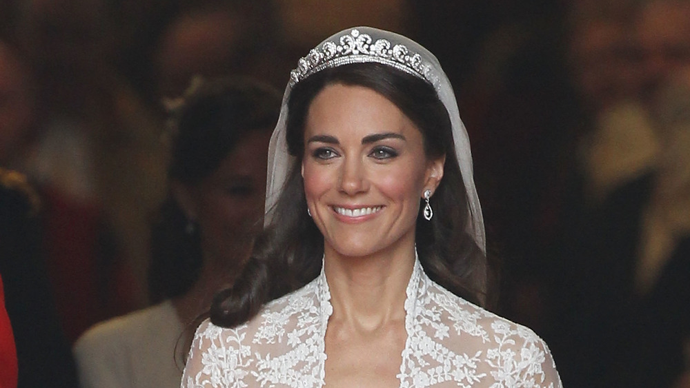 Kate Middleton on wedding day in tiara and veil smiling