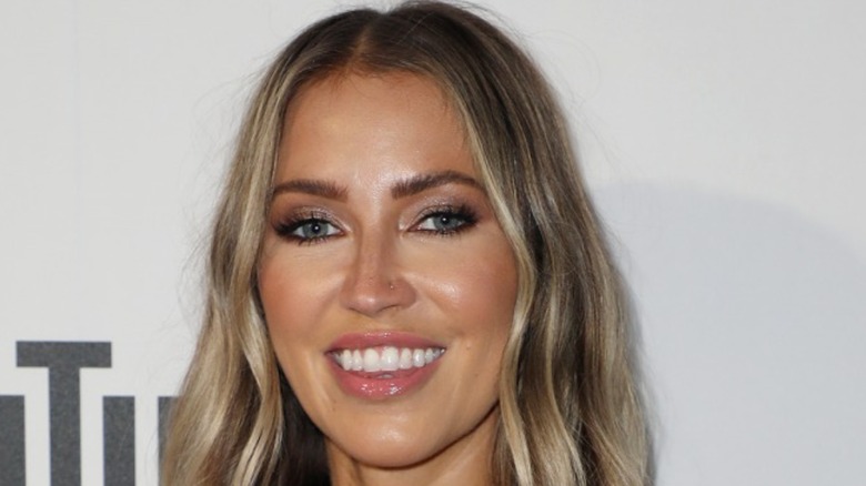 Kaitlyn Bristowe smiling at event