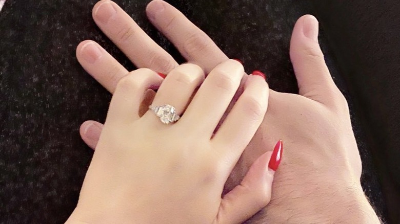Kat Dennings' hand with ring