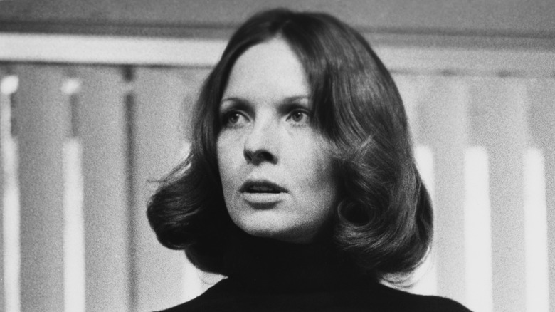 Diane Keaton in black and white looking off to the left.
