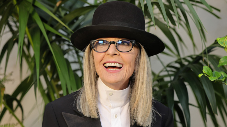 Diane Keaton wearing a black hat
