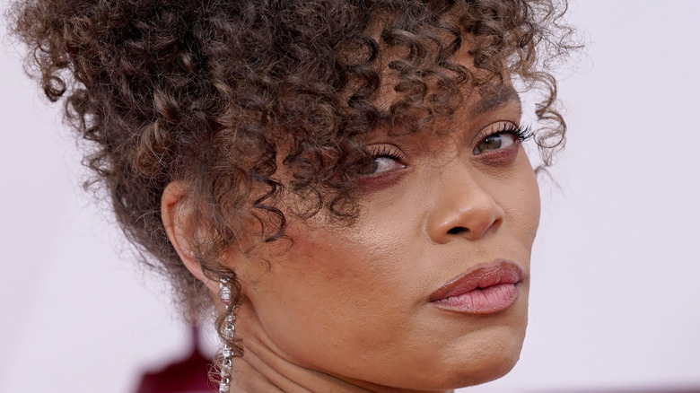 Andra Day posing on the red carpet