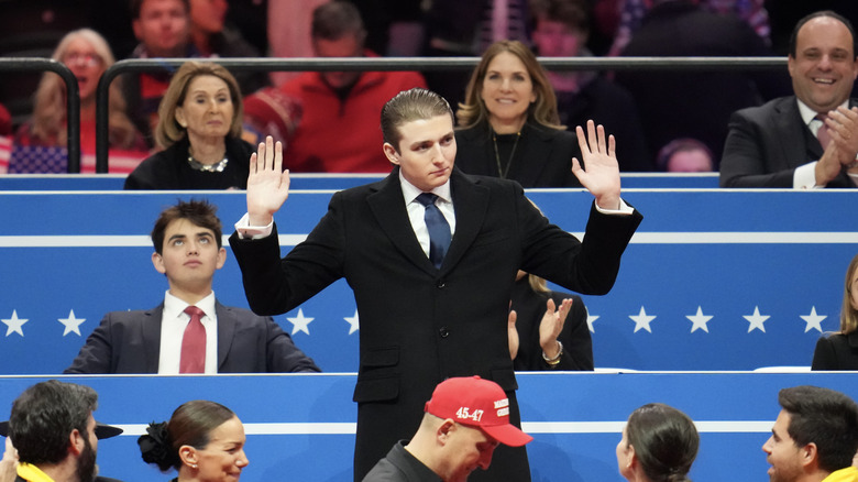 Barron Trump acknowledging a crowd at a rally