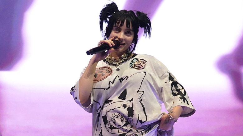 Billie Eilish performing onstage 