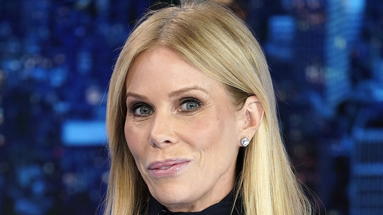 Cheryl Hines with a slight smile