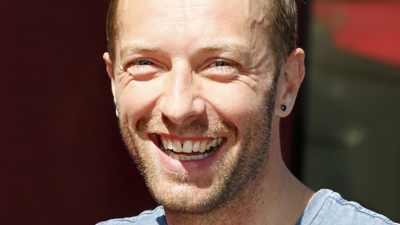 Chris Martin smiles for the camera