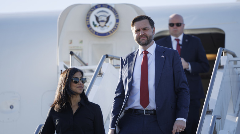 JD Vance and his wife Usha exiting Air Force Two.