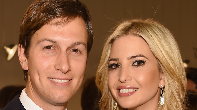 Ivanka Trump and Jared Kushner smiling at an event