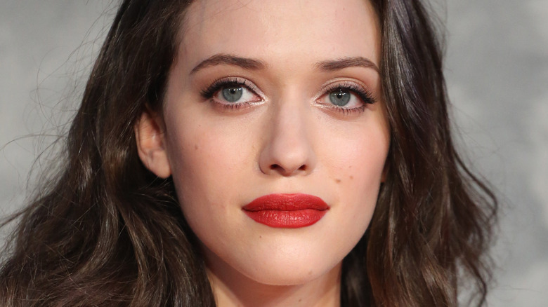 Kat Dennings with red lip and hair down