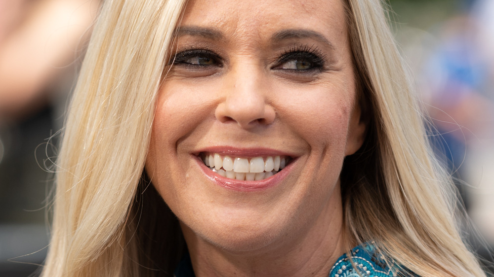 Kate Gosselin smiling in blue