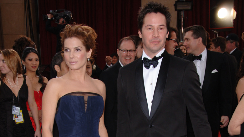 Sandra Bullock and Keanu Reeves on red carpet