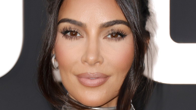Kim Kardashian smiling at an event