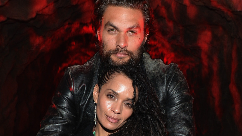 Jason Momoa and Lisa Bonet posing together 