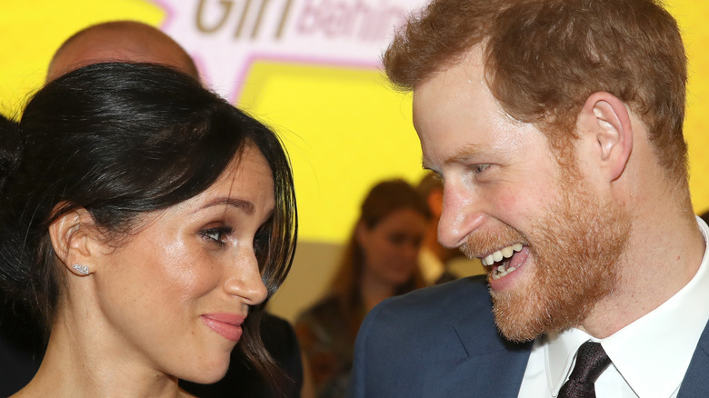 Prince Harry and Meghan Markle at an event. 