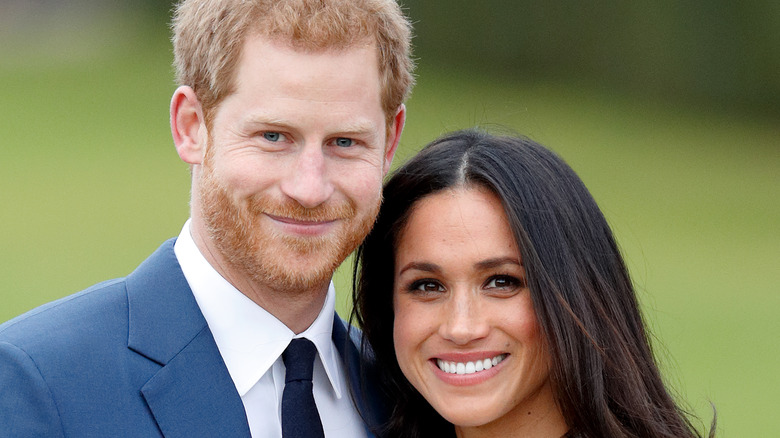 Prince Harry and Meghan Markle posing for a photo