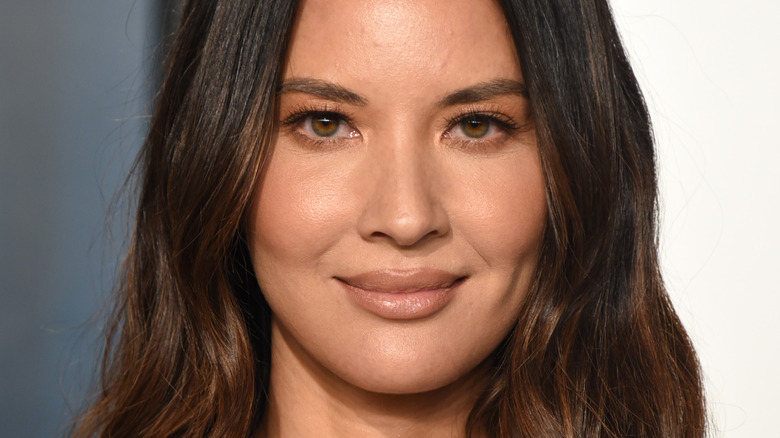 Olivia Munn poses at an event