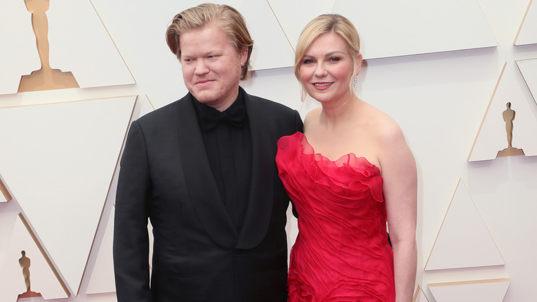 Kirsten Dunst and Jesse Plemons attend the Oscars