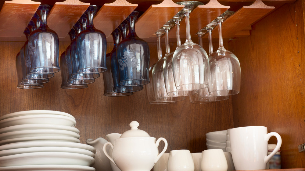 White plates and hanging glassware