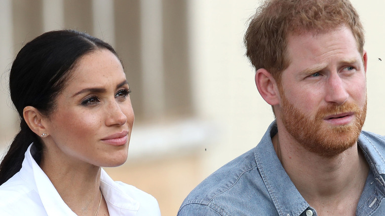 Prince Harry and Meghan Markle posing 