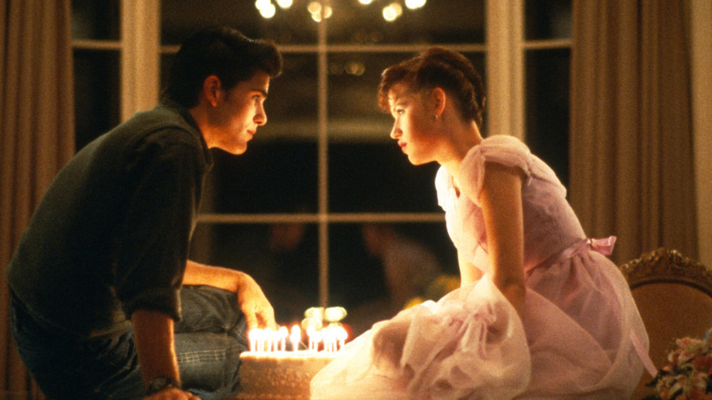 What is the meaning of In Sixteen Candles, the Asian character Long Duck  Dong is as an emasculated BUTT of the joke? - Question about English (US)