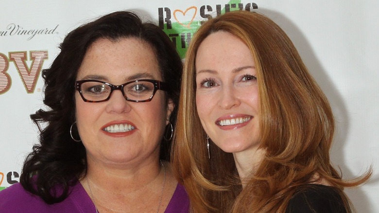 Rosie O'Donnell smiling with her then-wife Michelle Rounds.