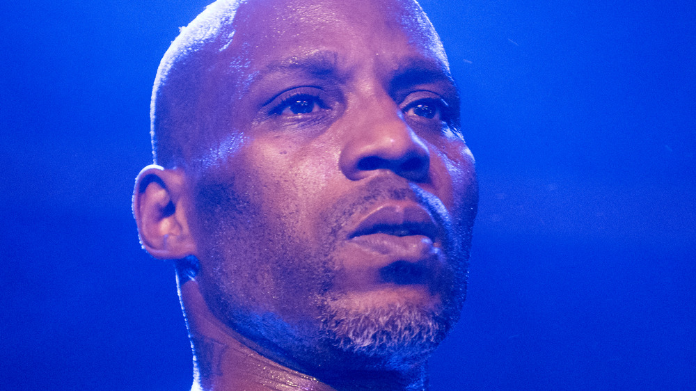 DMX performing under blue light