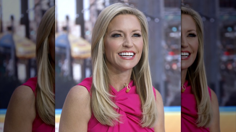 Ainsley Earhardt smiling in a pink sleeveless top