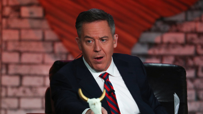 Gret Gutfeld chatting on the set of his show, Gutfeld
