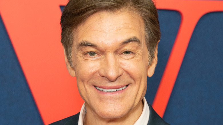 Dr. Oz poses for media