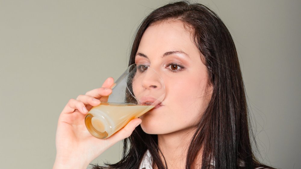 Woman drinking Emergen-C