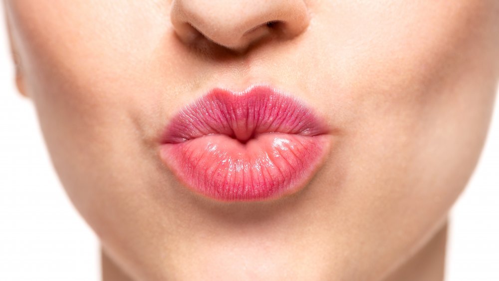 Woman pouting her lips