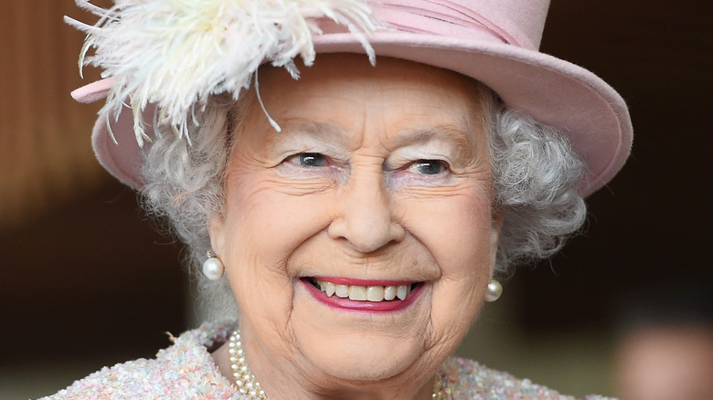 Queen Elizabeth smiles for a photo. 