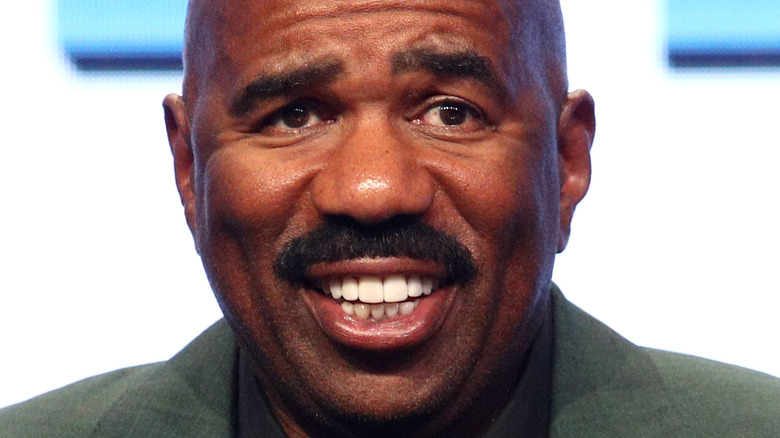 Steve Harvey smiling onstage