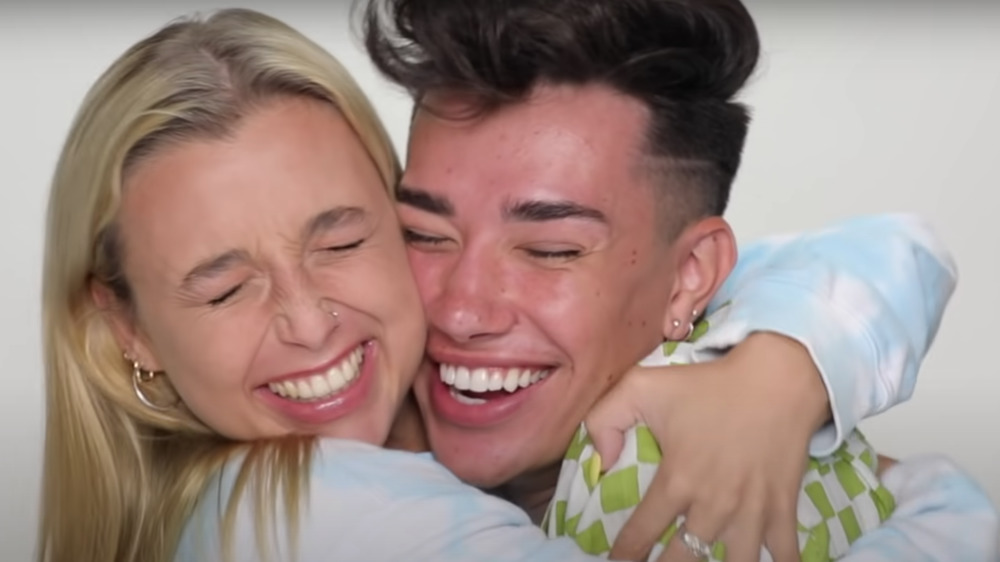 James Charles and Emma Chamberlain embrace