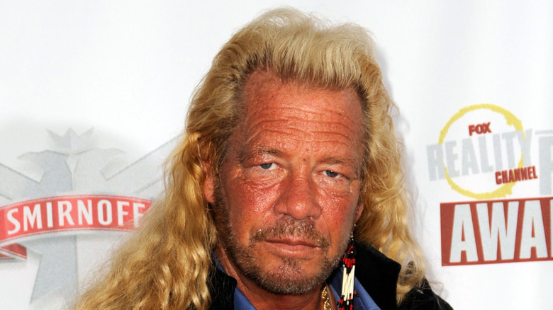 Dog the Bounty Hunter poses for a photo