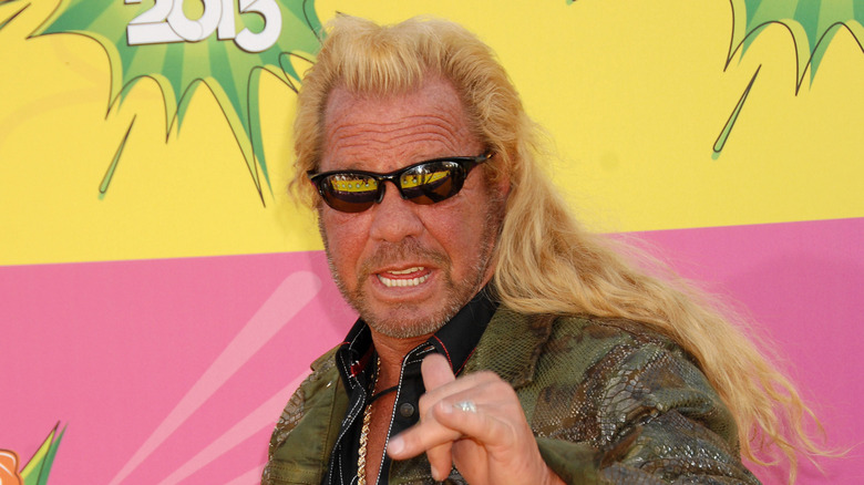 Dog the Bounty Hunter poses for a photo