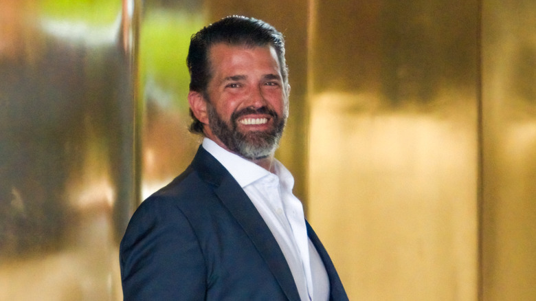 Donald Trump Jr. smiles at Trump Tower