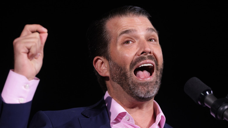 Donald Trump Jr. yelling into microphone