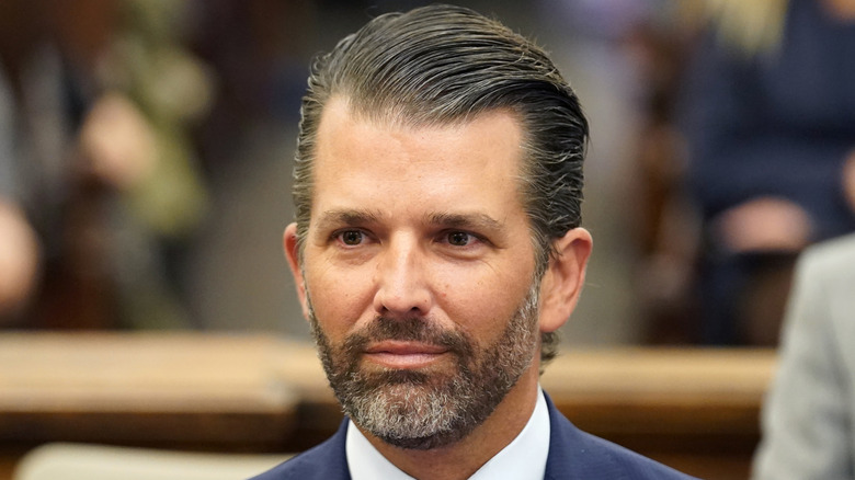 Donald Trump Jr. sits in court