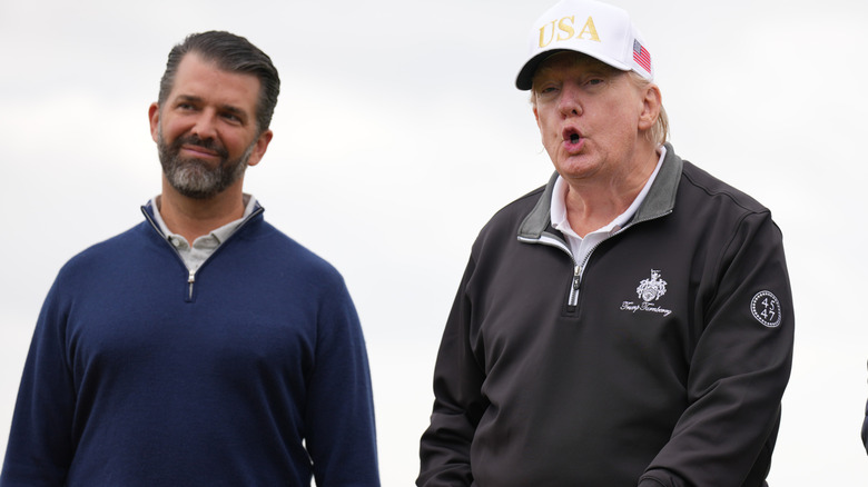 Donald Trump Jr. and Donald Trump standing together