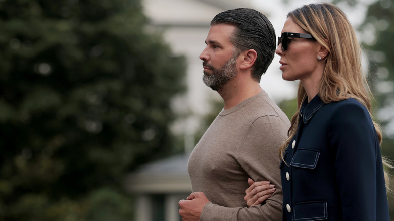 Donald Trump Jr. and Bettina Anderson walking
